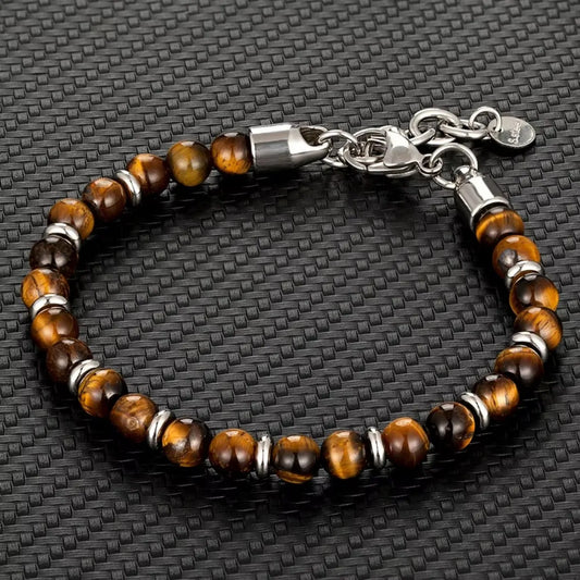 TigerSoul™ – Pulseira de Pedra Olho de Tigre com Corrente em Aço Inoxidável (Unissex)
Energia, proteção e estilo em uma peça versátil para homens e mulheres.