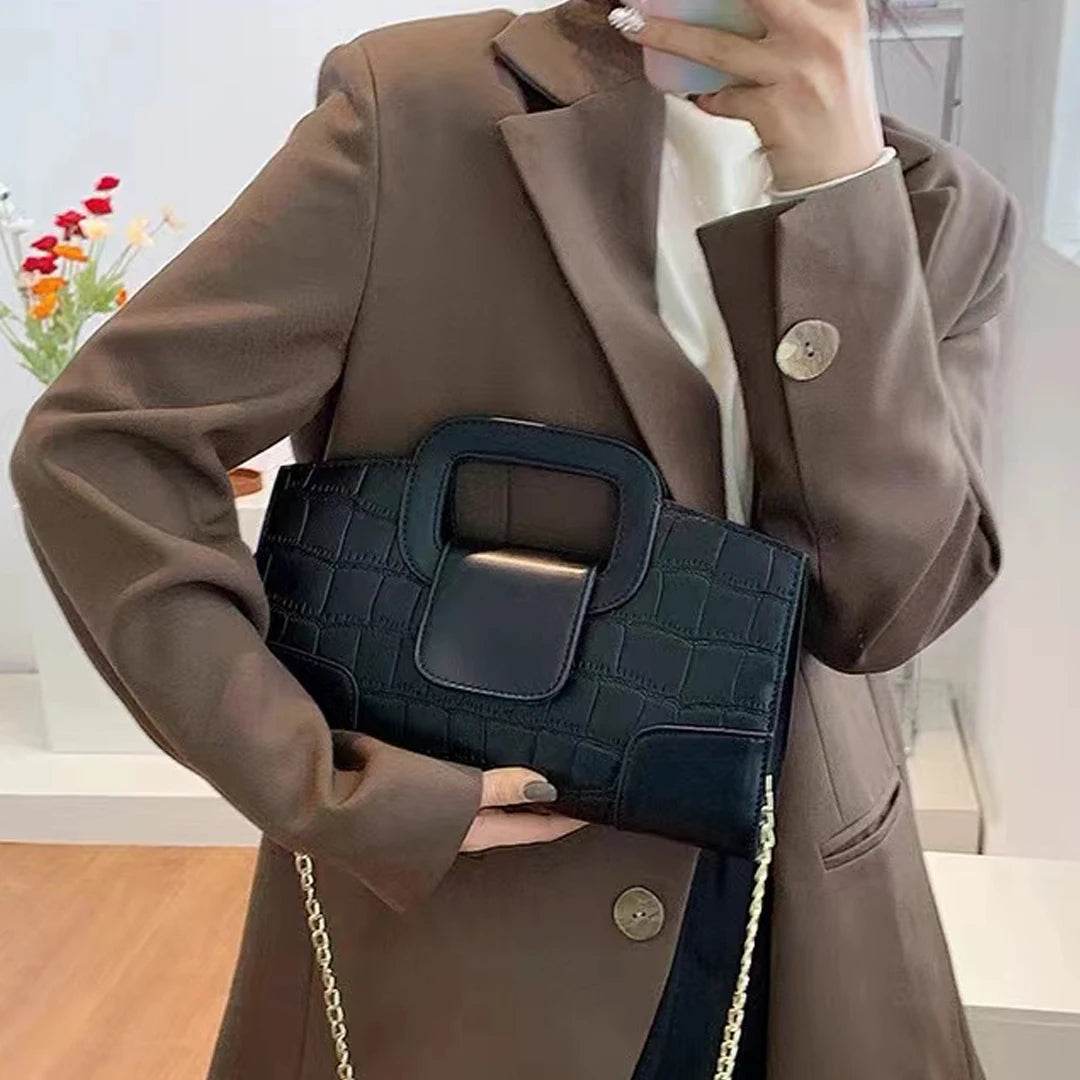 Noiréa Vintage Clutch