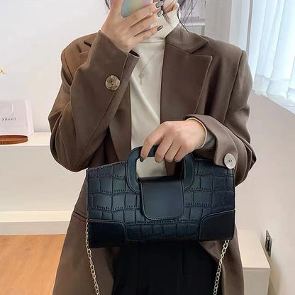 Noiréa Vintage Clutch